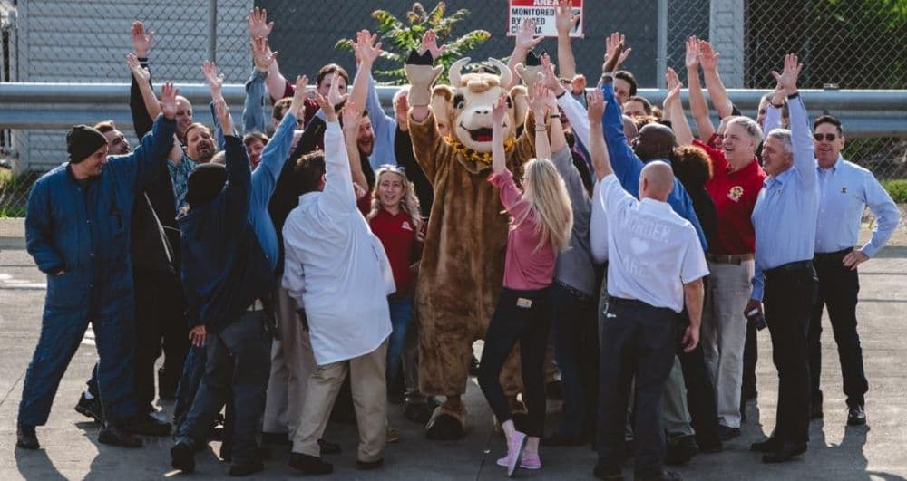 Borden team members with spokescow Elsie