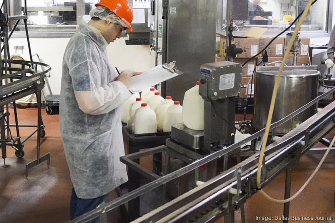 Modern dairy manufacturing facility, factory floor with stainless steel equipment - EqualStock on Unsplash